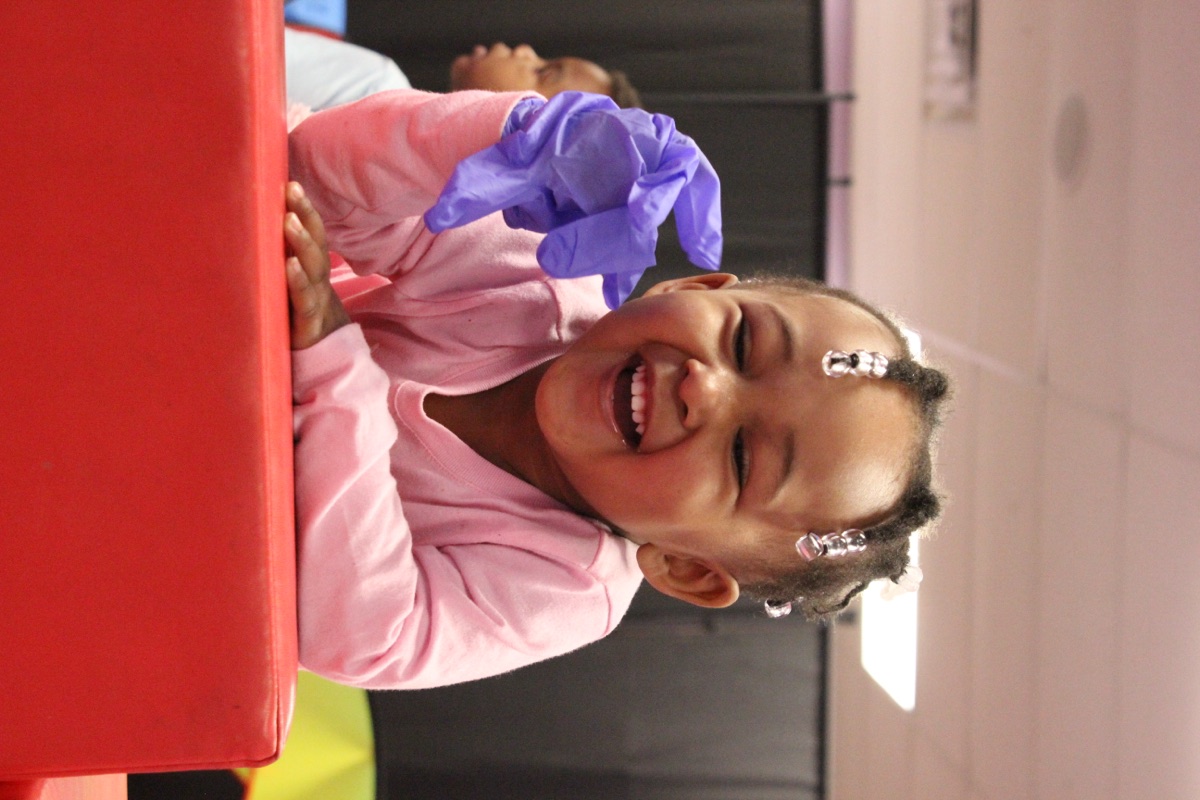 Happy toddler playing at daycare